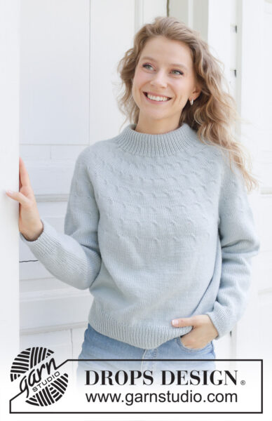 Gestrickte Damenbluse mit Muster auf runder Passe aus Merinowolle