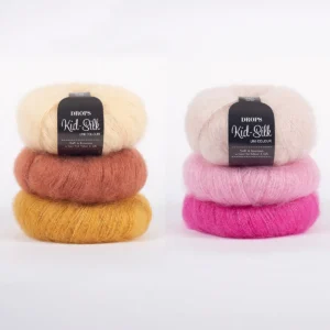 Drops Kid Silk Garn in warmen gelben und hellrosa Farben